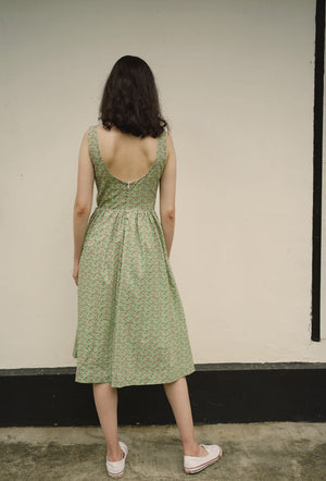 
                  
                    Catching the Sun Cotton Dress in Green Bloom
                  
                